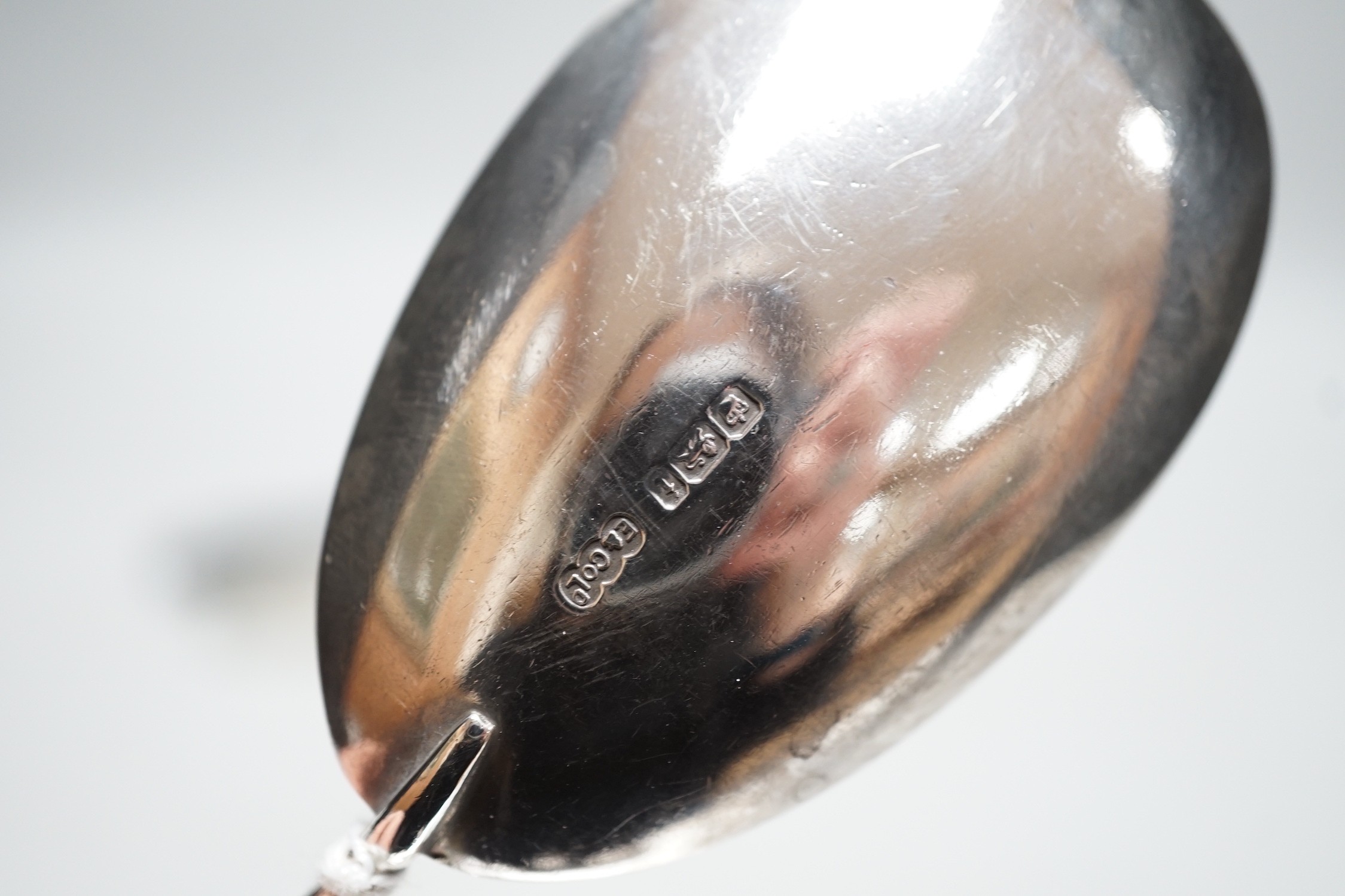 A pair of Edwardian glass handled silver salad servers, Sheffield, 1901, 26.9cm together with a modern wooden handled silver extinguisher and a pair of plated candle snuffers.